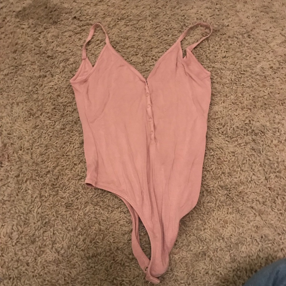 pink body suit